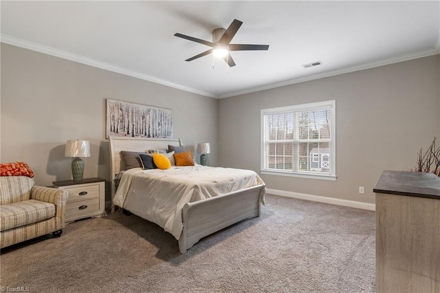 bedroom featuring ceiling fan, carpet, and ornamental molding