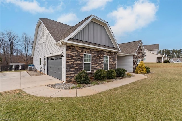 view of property exterior with a yard and central AC