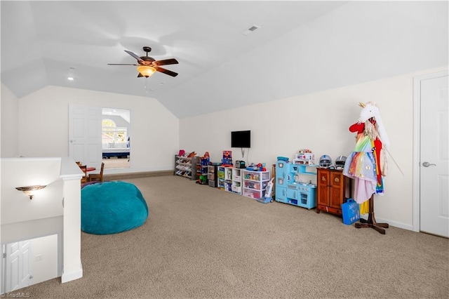 game room with carpet floors, ceiling fan, baseboards, and lofted ceiling