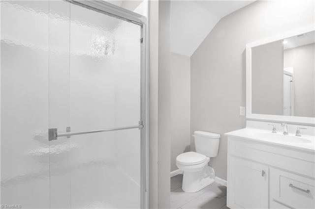 bathroom featuring vanity, marble finish floor, toilet, baseboards, and a stall shower