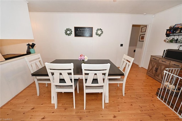 dining room featuring light hardwood / wood-style flooring