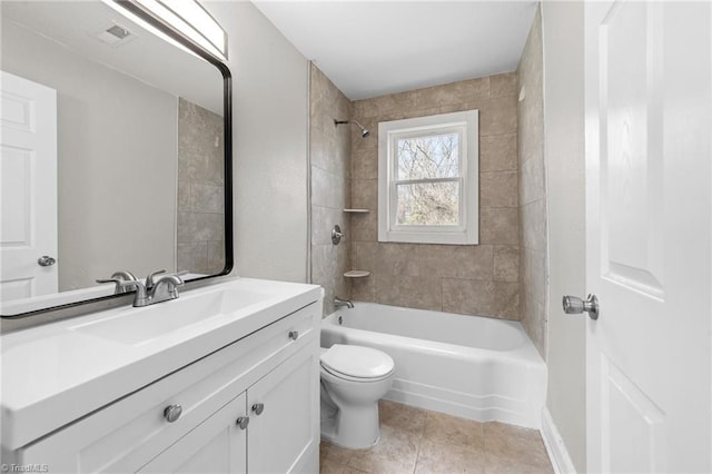 full bath featuring toilet, tile patterned flooring, vanity, and bathing tub / shower combination