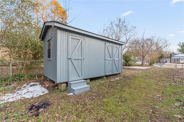 view of outdoor structure featuring a yard