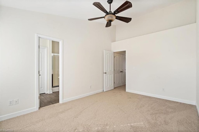 unfurnished bedroom with carpet and ceiling fan