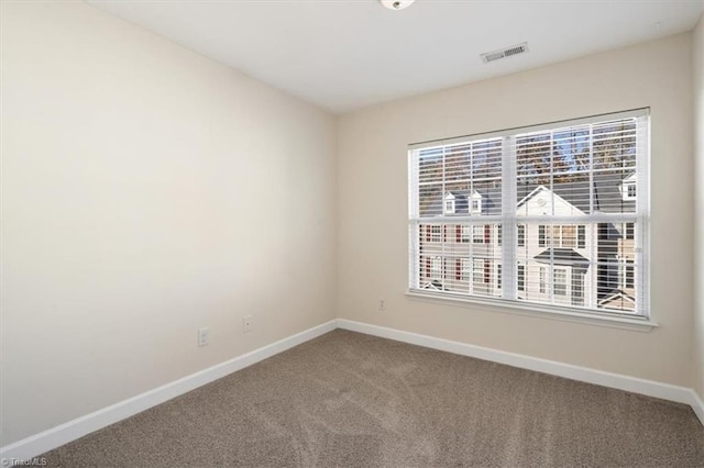 view of carpeted spare room