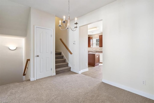 interior space with carpet and a chandelier