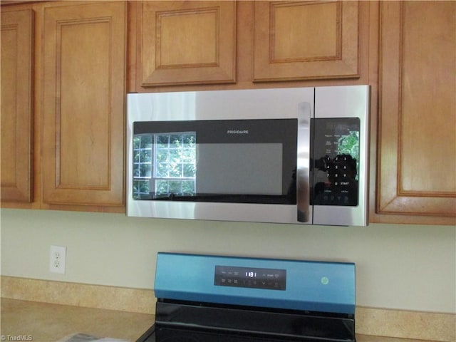 917 Avalon Acres Ct, High Point, NC 27265 - detailed view of appliances with stainless steel finishes and light countertops