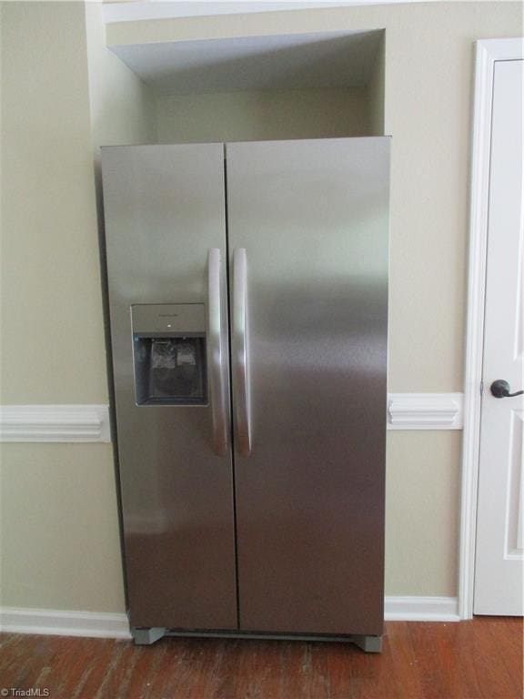 917 Avalon Acres Ct, High Point, NC 27265 - kitchen view of stainless steel refrigerator with ice dispenser, wood finished floors, and baseboards