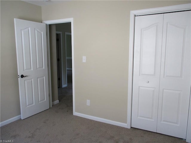 917 Avalon Acres Ct, High Point, NC 27265 - unfurnished bedroom with carpet, baseboards, and a closet