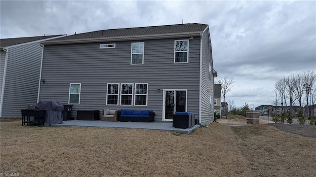 back of property featuring central air condition unit, a yard, and a patio