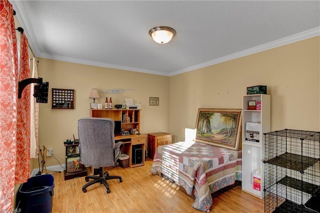 bedroom featuring hardwood / wood-style floors and ornamental molding