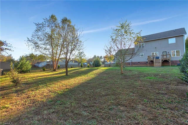 view of yard featuring a wooden deck