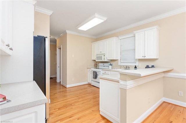 2012 Muirfield Ct, Elon, NC 27244 - kitchen with white appliances, light wood finished floors, a peninsula, white cabinets, and baseboards