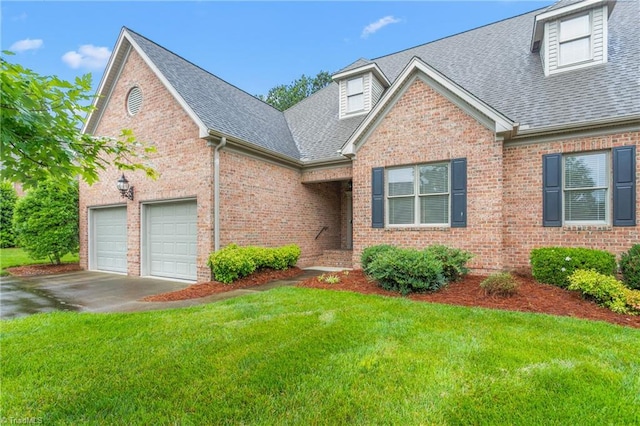 2012 Muirfield Ct, Elon, NC 27244 - view of front of property featuring a shingled roof, brick siding, a garage, a front lawn, and driveway