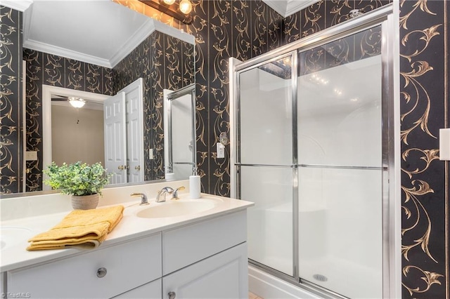 2012 Muirfield Ct, Elon, NC 27244 - full bathroom featuring wallpapered walls, ornamental molding, double vanity, and a stall shower