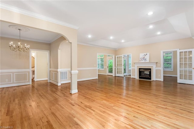 2012 Muirfield Ct, Elon, NC 27244 - unfurnished living room with light wood-style floors, ornamental molding, a fireplace with flush hearth, recessed lighting, and a chandelier