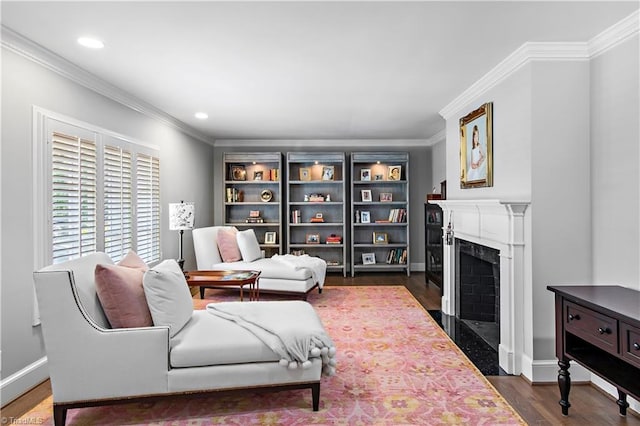 living room with crown molding, a high end fireplace, baseboards, recessed lighting, and dark wood-style flooring