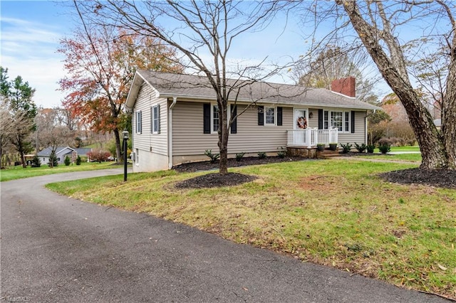 view of front of home with a front yard