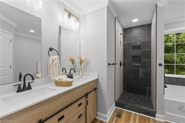 411 Motif Ln, Winston-Salem, NC 27107 - bathroom with double vanity, a bath, wood finished floors, a tile shower, and ornamental molding