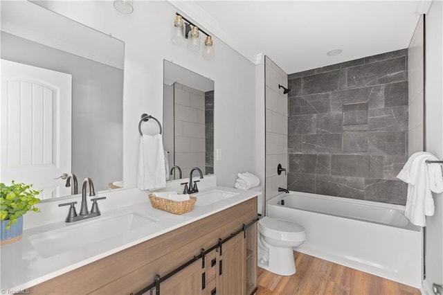 411 Motif Ln, Winston-Salem, NC 27107 - bathroom featuring double vanity, shower / bath combination, and wood finished floors