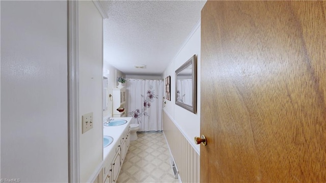 4211 Village Dr, Trinity, NC 27370 - full bathroom with tile patterned floors, toilet, a shower with shower curtain, a textured ceiling, and vanity