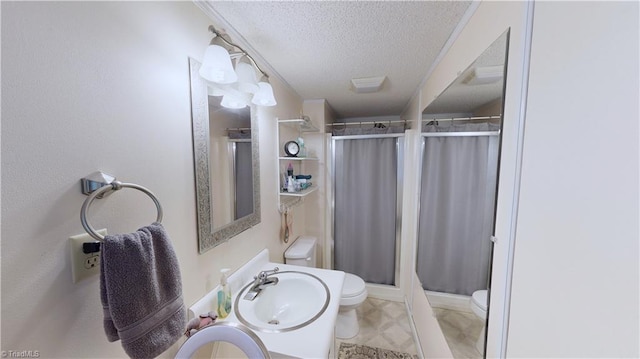 4211 Village Dr, Trinity, NC 27370 - bathroom featuring toilet, a textured ceiling, a stall shower, and vanity