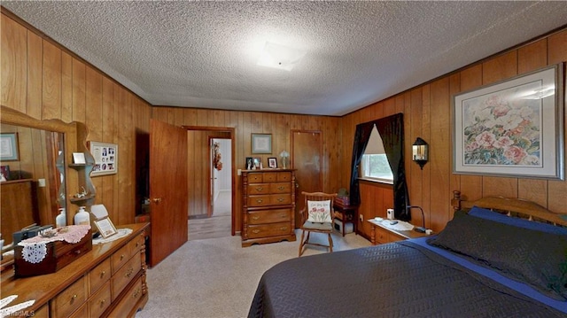 4211 Village Dr, Trinity, NC 27370 - bedroom featuring wood walls, light carpet, and a textured ceiling