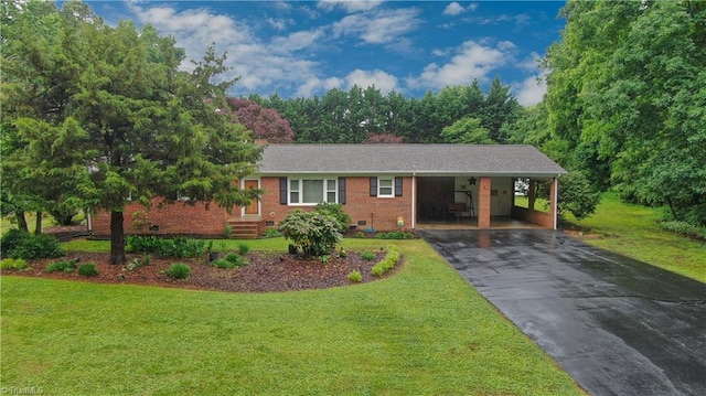 4211 Village Dr, Trinity, NC 27370 - ranch-style home featuring driveway, a front yard, crawl space, a carport, and brick siding