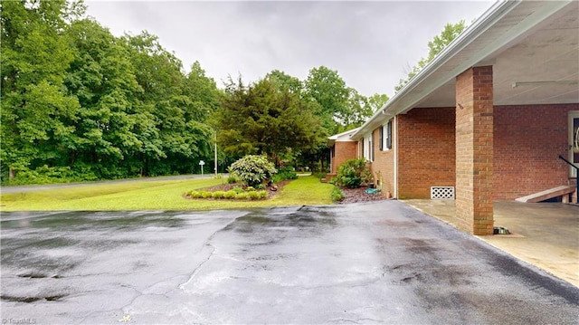 4211 Village Dr, Trinity, NC 27370 - view of patio featuring view of scattered trees