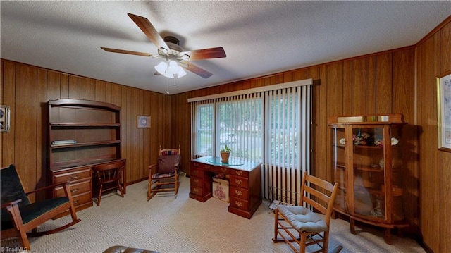 4211 Village Dr, Trinity, NC 27370 - carpeted office space with a ceiling fan, wood walls, and a textured ceiling