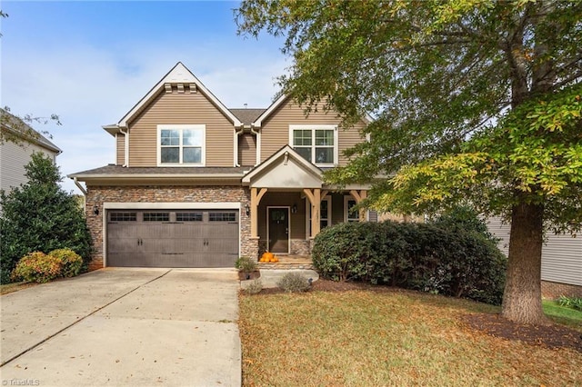 craftsman inspired home featuring a front lawn and a garage