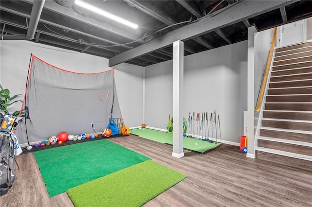 game room with hardwood / wood-style flooring