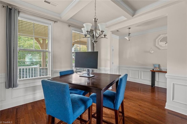 dining room with beam ceiling, a healthy amount of sunlight, and ornamental molding