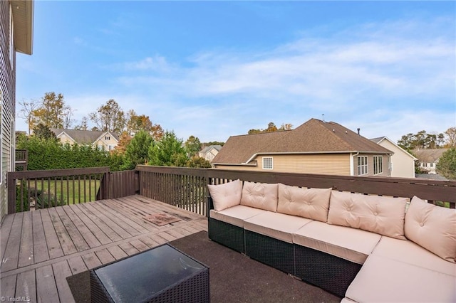 deck featuring outdoor lounge area