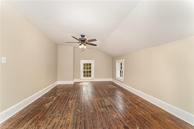 additional living space with ceiling fan, hardwood / wood-style floors, and lofted ceiling