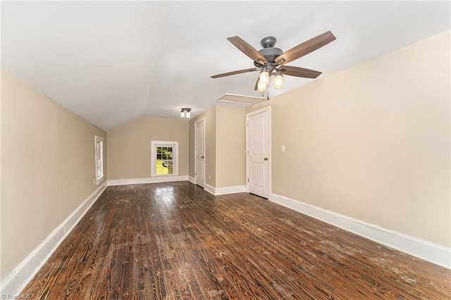 bonus room featuring ceiling fan, dark wood-type flooring, and vaulted ceiling