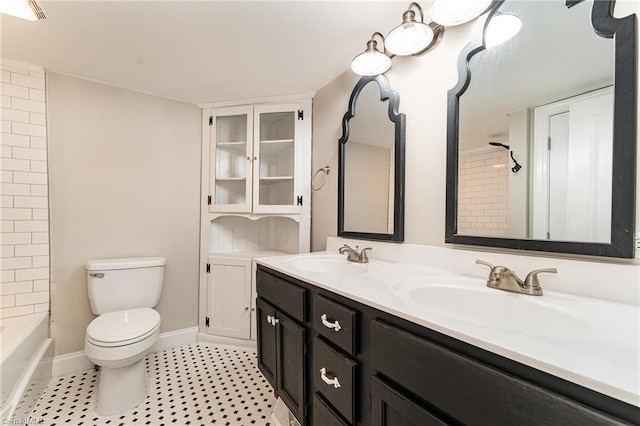 full bathroom with toilet, vanity, and shower / washtub combination