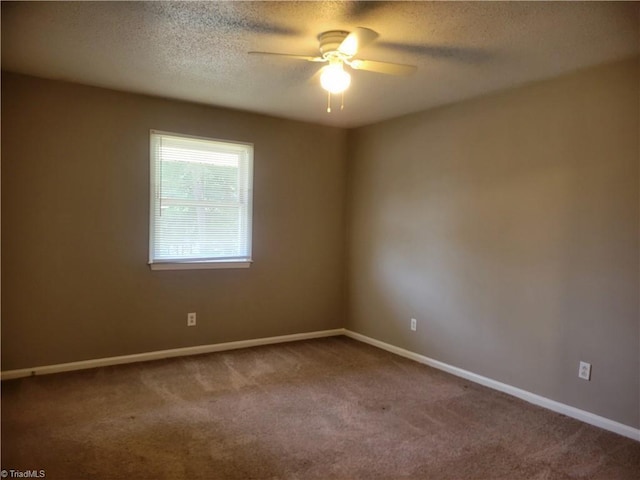 4001 S Bend Dr Unit 101, Winston-Salem, NC 27107 - carpeted spare room featuring ceiling fan, a textured ceiling, and baseboards