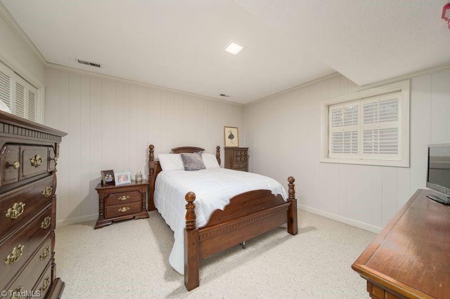 carpeted bedroom with crown molding