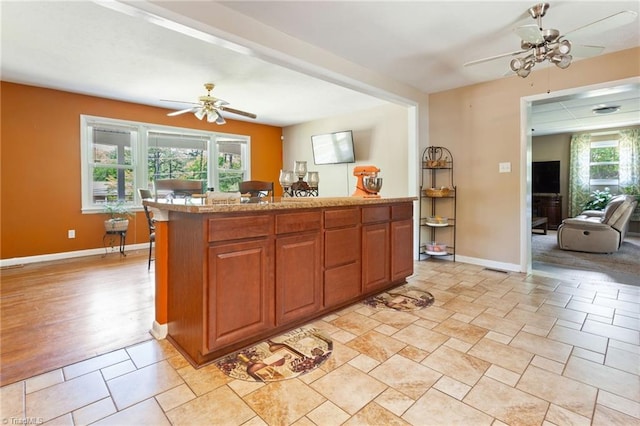 interior space with a ceiling fan
