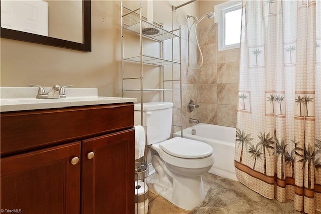 full bathroom with toilet, vanity, and shower / tub combo with curtain
