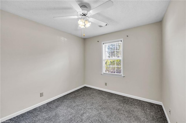 unfurnished room featuring carpet flooring, a ceiling fan, baseboards, and a textured ceiling