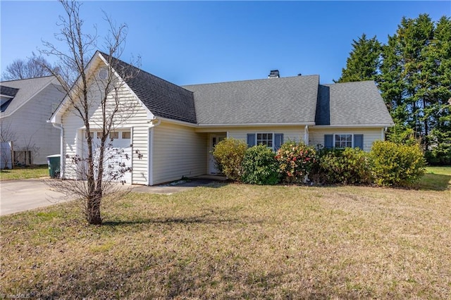 view of front of home with a shingled roof, a front lawn, concrete driveway, a chimney, and an attached garage