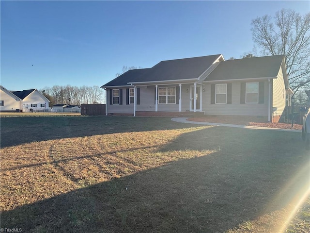 ranch-style house with a front lawn