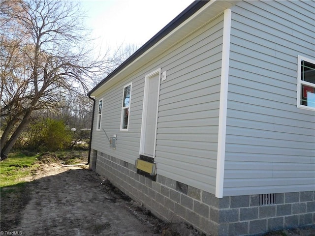 view of property exterior featuring crawl space