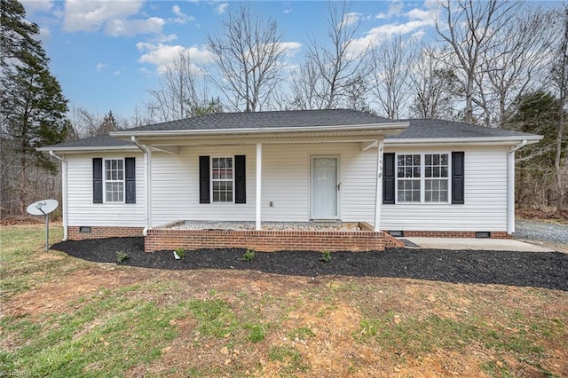 view of front facade with a shingled roof, a porch, a front lawn, and crawl space