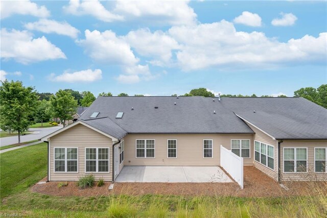 6924 Langdon Village Ct, Clemmons, NC 27012 - back of property featuring a patio and a lawn