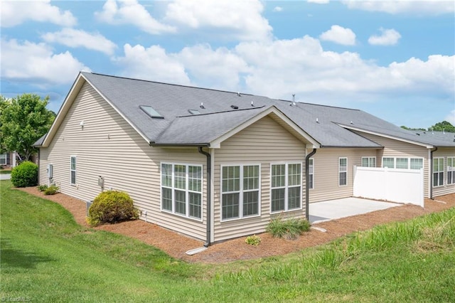 6924 Langdon Village Ct, Clemmons, NC 27012 - rear view of house featuring a patio and a shingled roof