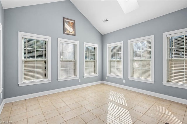 unfurnished sunroom featuring vaulted ceiling