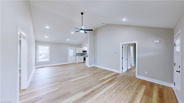 unfurnished living room featuring ceiling fan, high vaulted ceiling, and light hardwood / wood-style floors